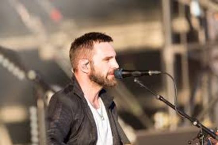 Johnny Mcdaid is the member of Snow Patrol